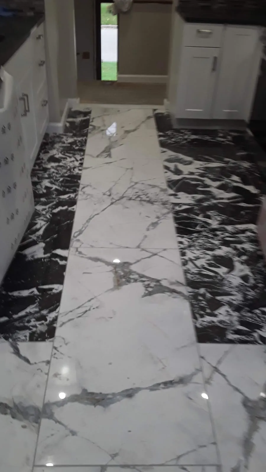 Black and white tiling kitchen.