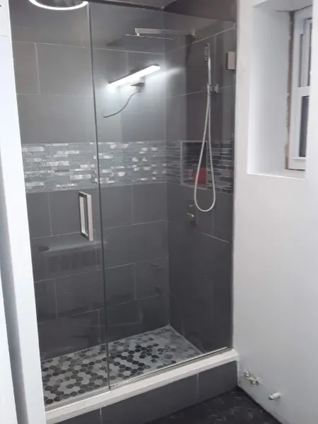 Finished black shower and shelf.