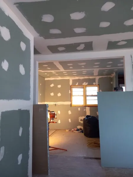 Drywall grayish blue, with spots of white.